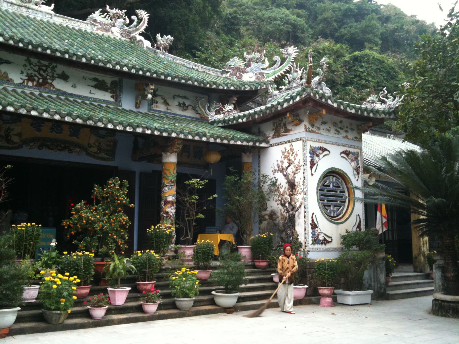 Linh Ung Pagoda on Thuy Son in the Marble Mountains, a yellow temple and tall tower above the coast
