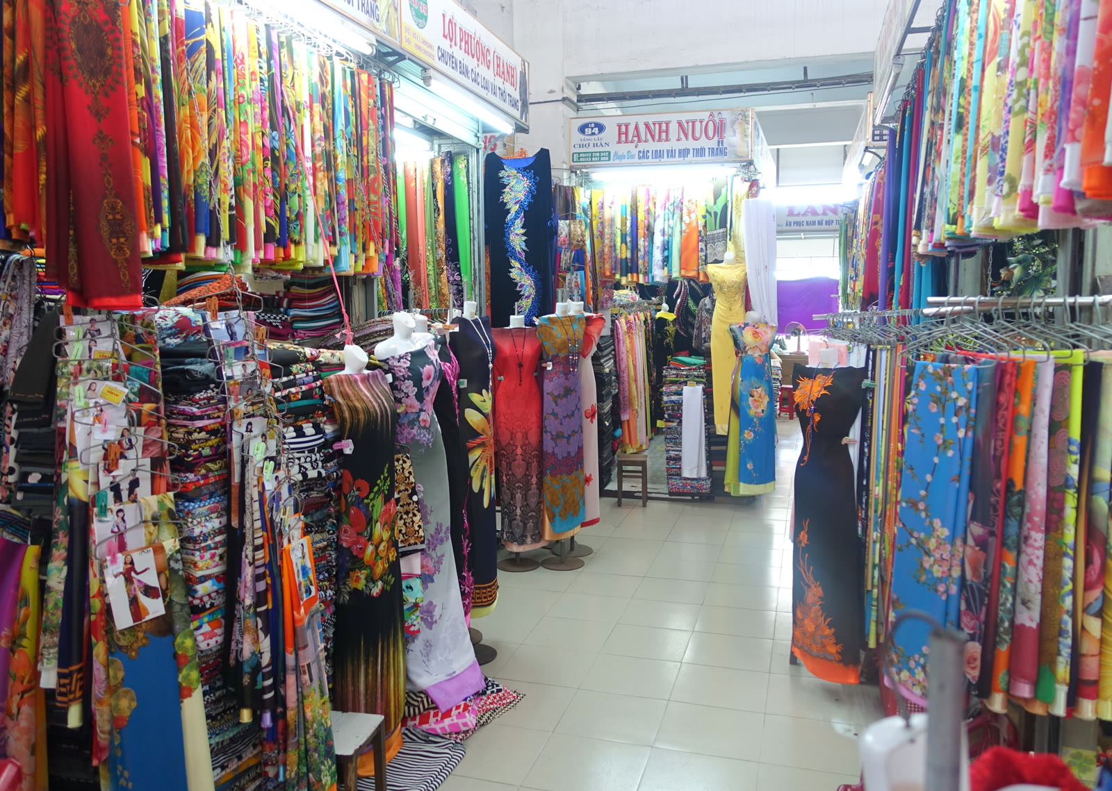 Bolts of fabric stacked on the upper floor of Han Market in Da Nang