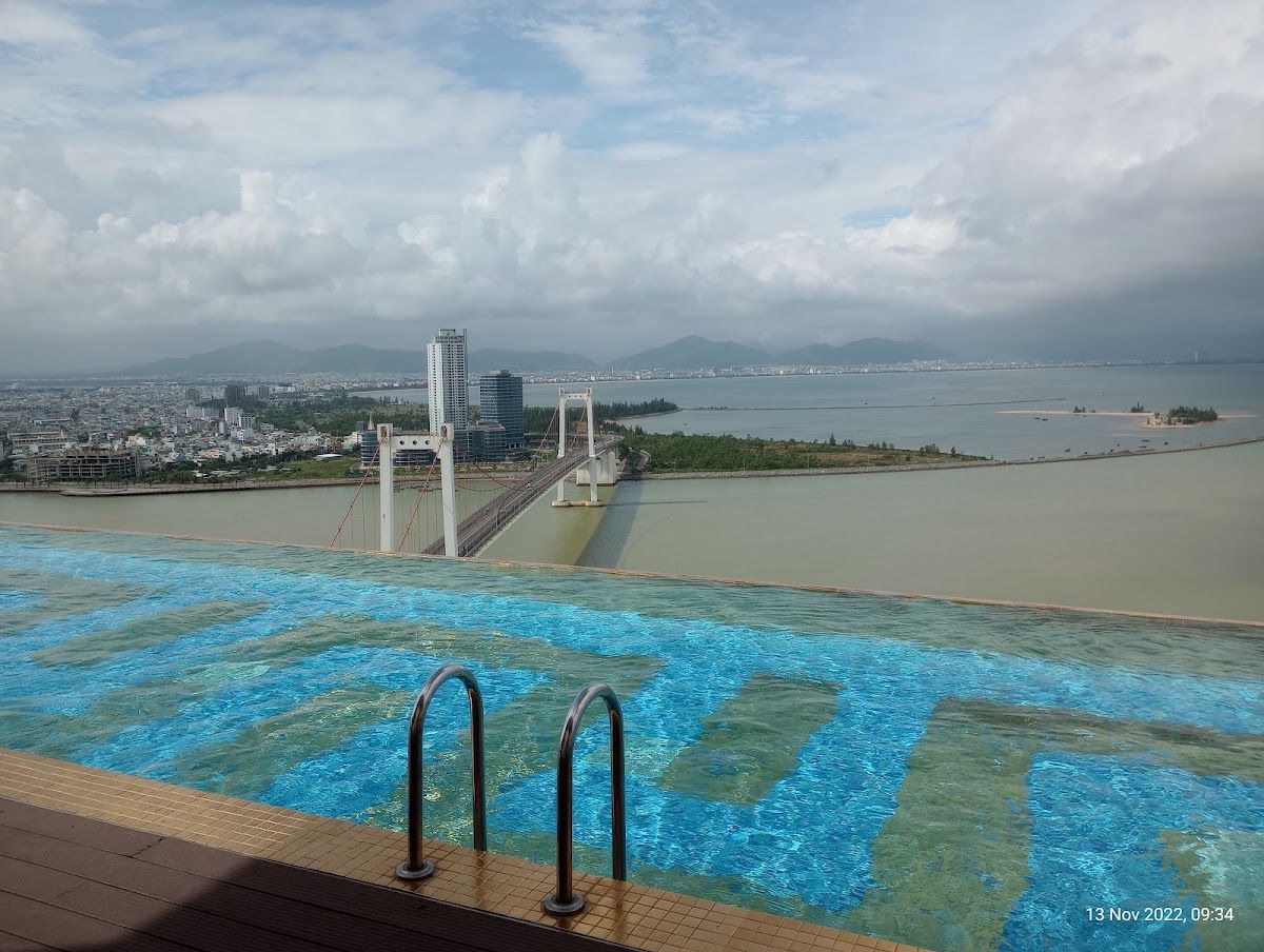 Infinity pool at Wyndham Danang Golden Bay on the 29th floor, overlooking the Thuan Phuoc suspension bridge and Da Nang Bay