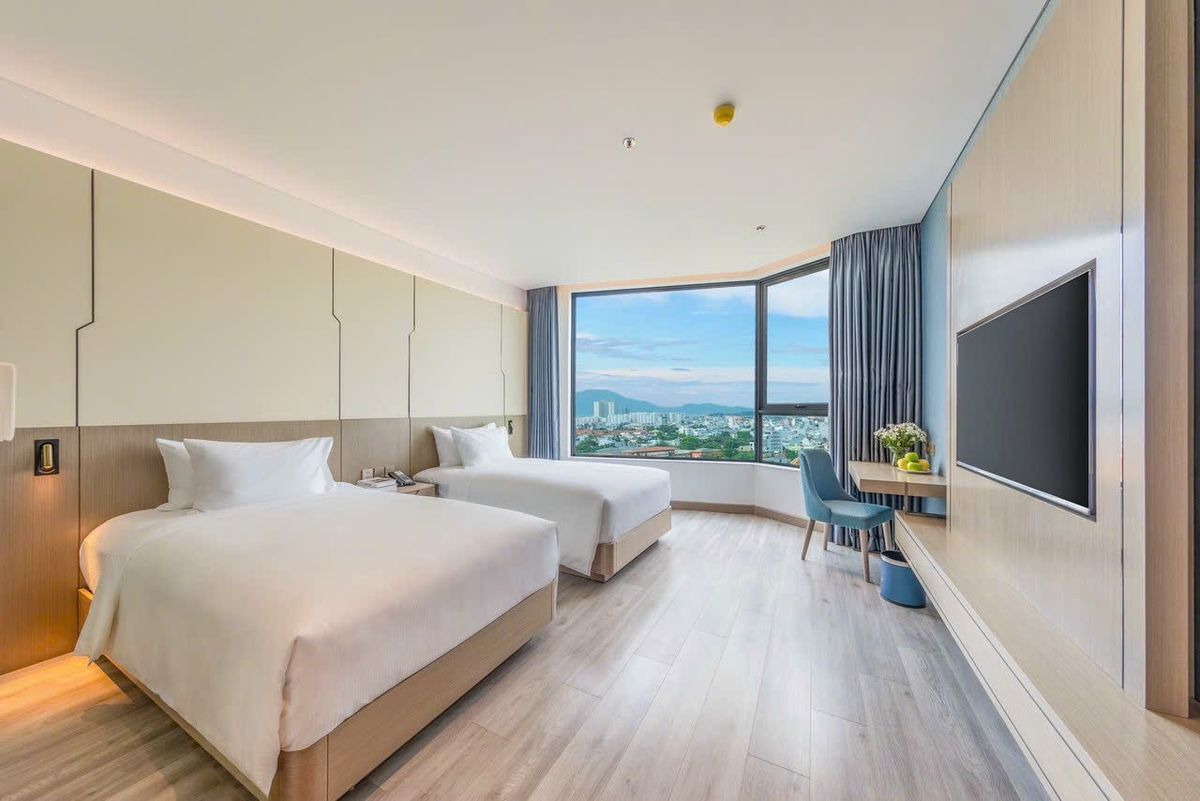 Awaken Danang Hotel pool and grounds in Da Nang City Centre