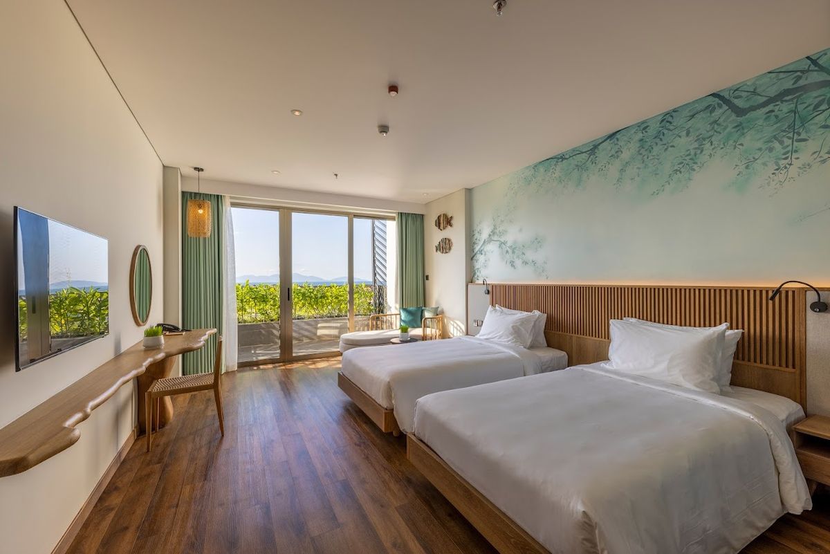 Bellerive Hoi An Hotel & Spa pool and grounds in Cua Dai