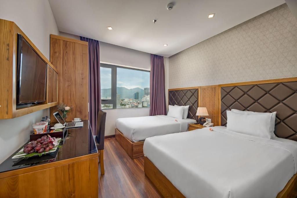 Bliss Luxury Hotel & Spa Da Nang pool and grounds in My Khe Beach