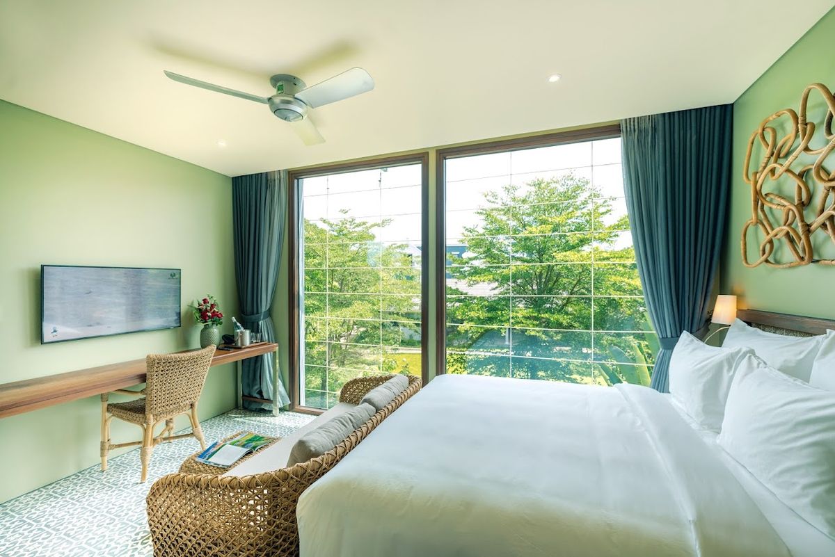 CHiEM HoiAn - The Beachside Boutique Hotel & Villa pool and grounds in Hoi An Old Town