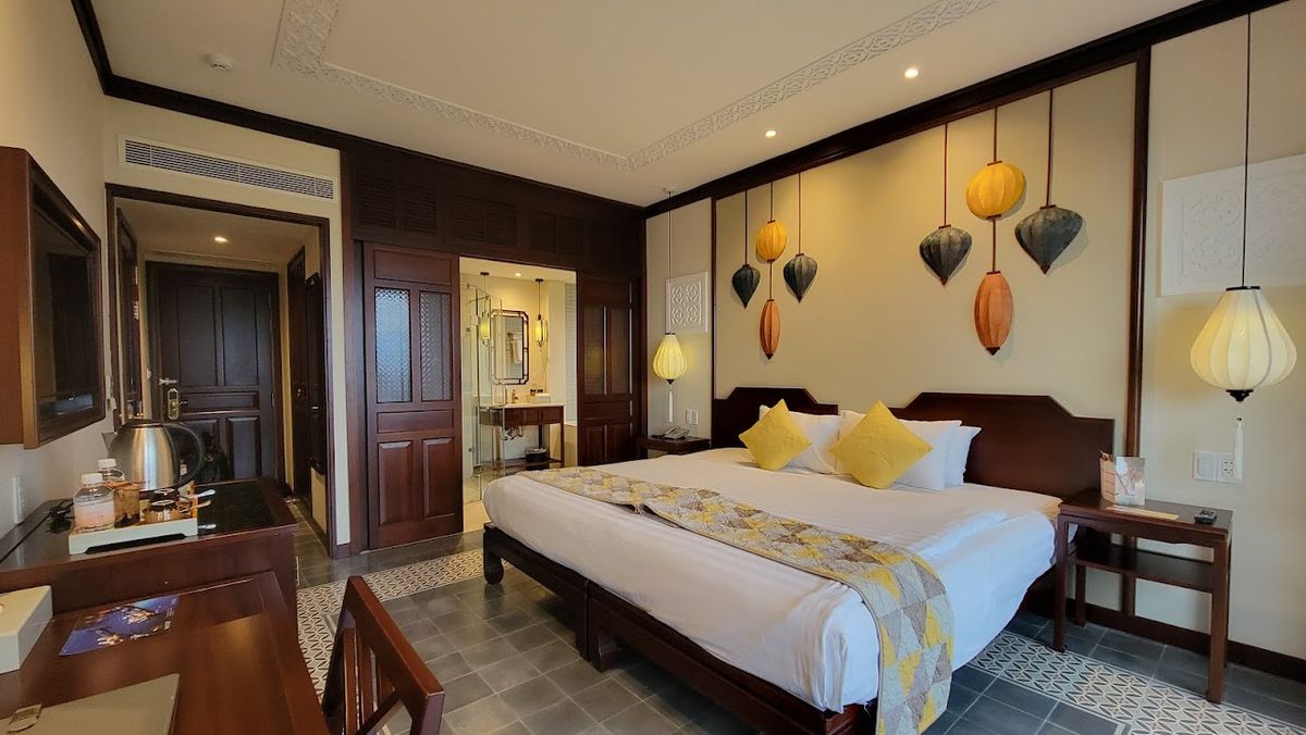 Cozy Savvy Hoi An - The Quintessence of Exquisite Retreat pool and grounds in Hoi An Old Town