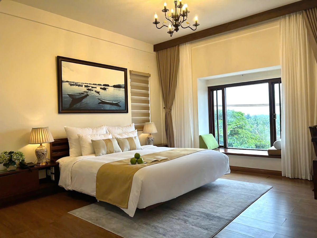 Happy Life Memories HoiAn Hotel & Spa pool and grounds in Cua Dai