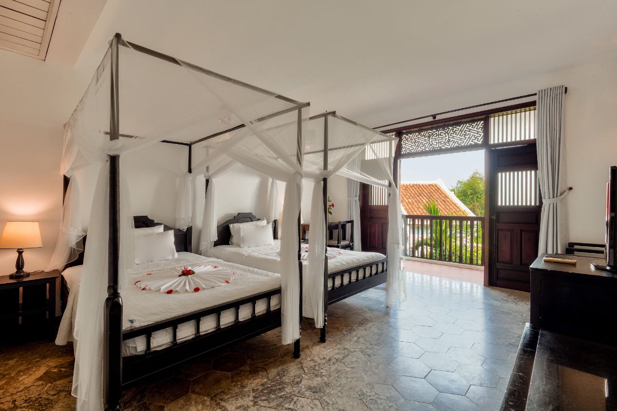 Hoi An Ancient House Resort & Spa pool and grounds in Hoi An Old Town