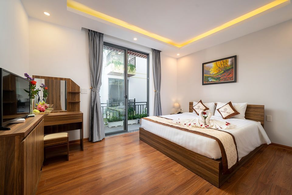 Hoi An Aurora Riverside Hotel pool and grounds in Hoi An Old Town