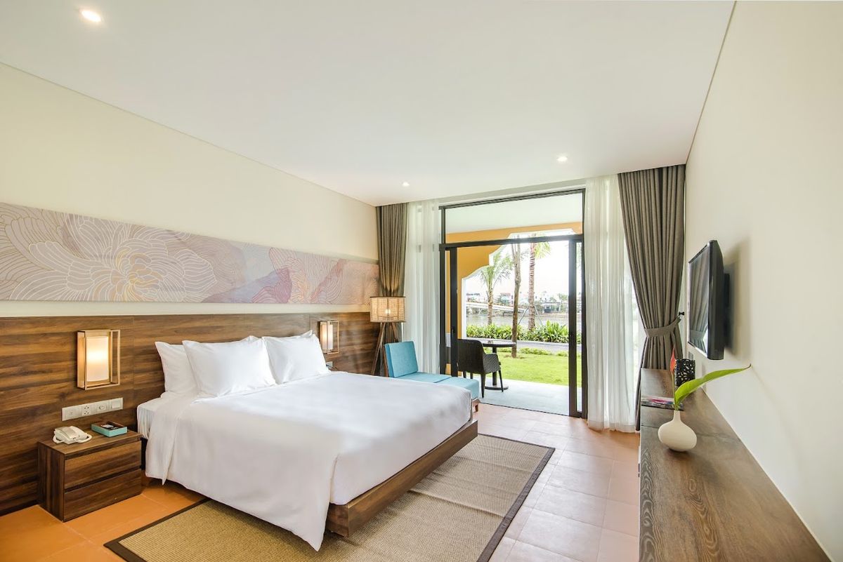 HOI AN MEMORIES HOTEL by Fusion pool and grounds in Hoi An Old Town