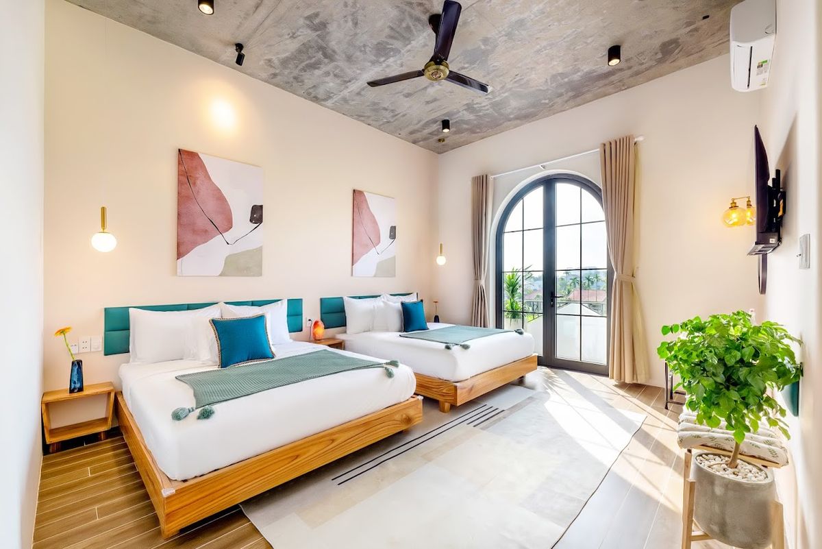 Hội An Pinus Boutique and Apartment pool and grounds in Cua Dai