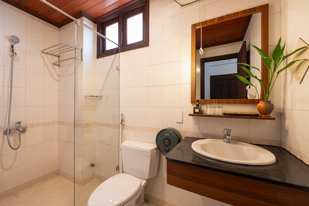 Hoianese Tranquil Heritage Hotel - Cultural Experiential Hotel room interior in Hoi An Old Town