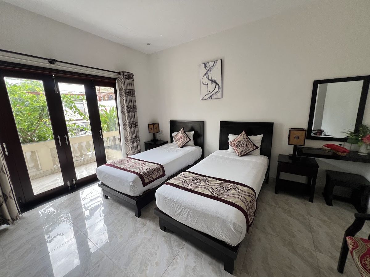 Pham Gia Boutique Homestay Villa pool and grounds in Hoi An Old Town