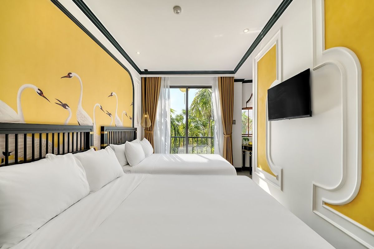 Rokas Hoi An Boutique Hotel pool and grounds in Cua Dai