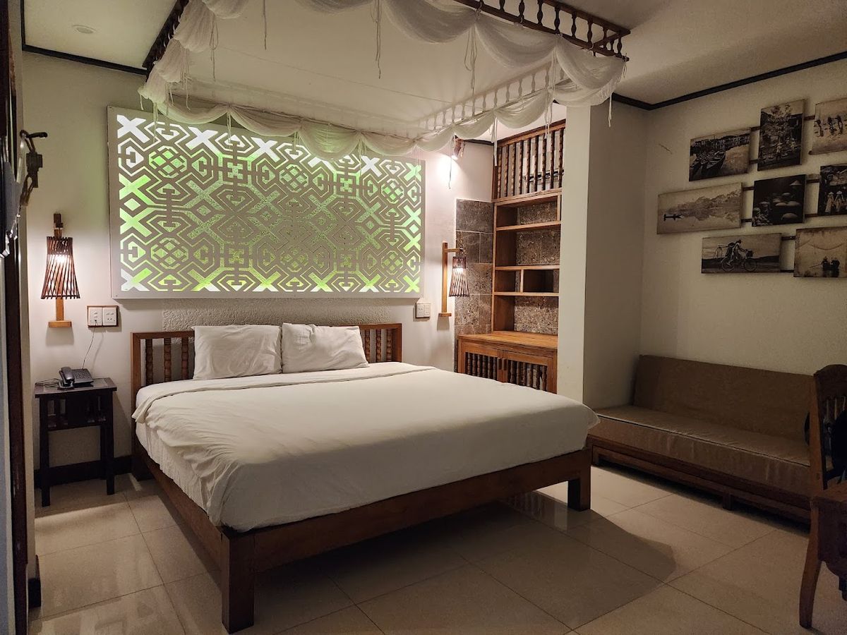 Vinh Hung Library Hotel pool and grounds in Hoi An Old Town