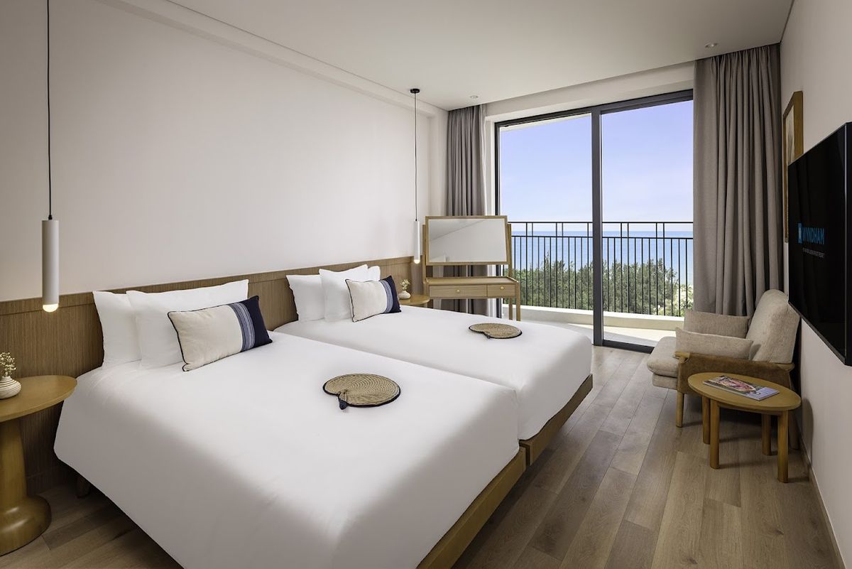 Wyndham Royal Beachfront Resort & Spa Danang pool and grounds in Hoi An Old Town